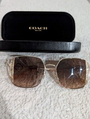Coach Gold Metal Frame Sunglasses with Brown Gradient Lenses